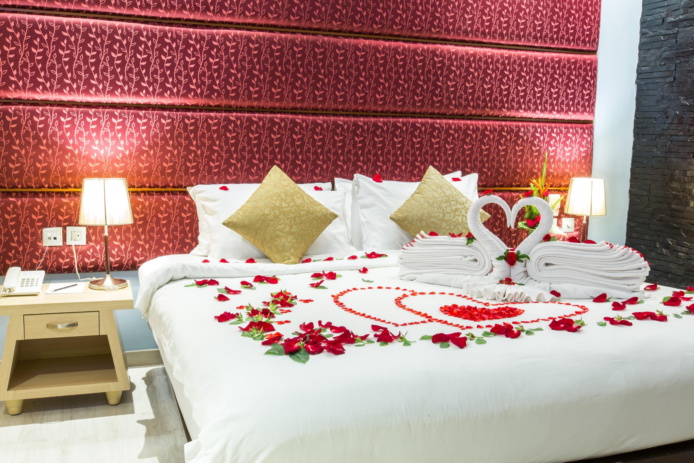 Indochine Resort And Villas - Sha Extra Plus Patong Eksteriør billede A bed decorated with rose petals